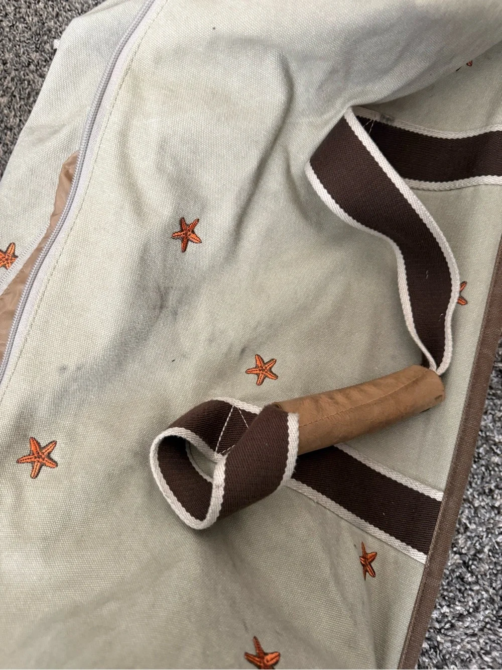 L.L. Bean Cream Canvas Duffel with Brown Straps and Orange Star Accents